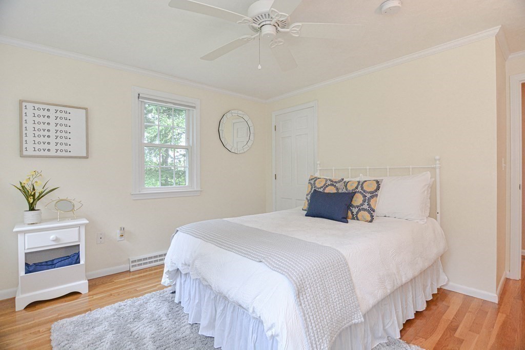 520 Burroughs Road Boxborough, MA 01719 - Photo 19 of 34 a bedroom with a bed and a window