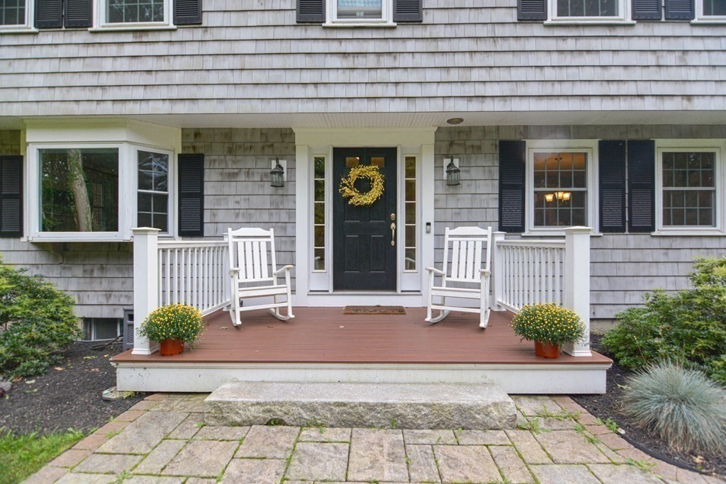 520 Burroughs Road Boxborough, MA 01719 - Photo 27 of 34 a front view of a house with potted plants