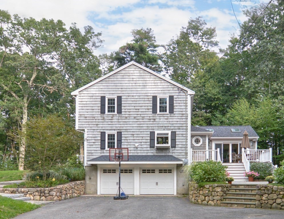 520 Burroughs Road Boxborough, MA 01719 - Photo 30 of 34 a front view of a house with a yard