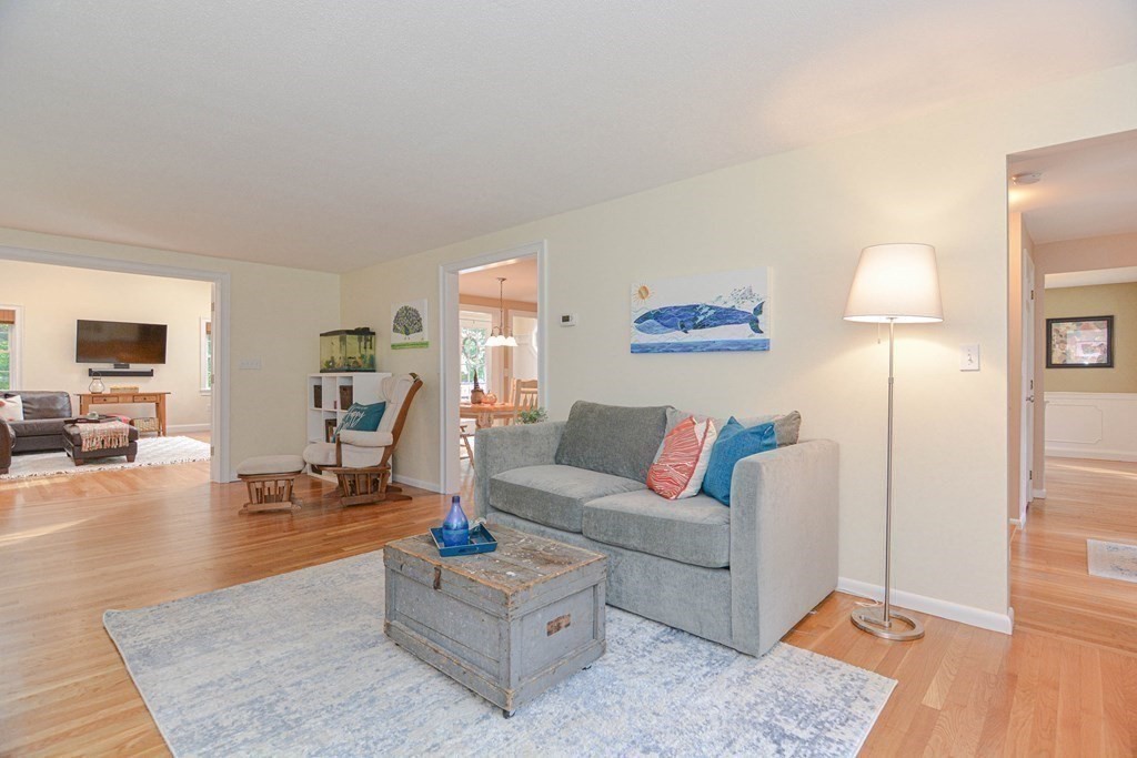 520 Burroughs Road Boxborough, MA 01719 - Photo 10 of 34 a living room with furniture and a wooden floor