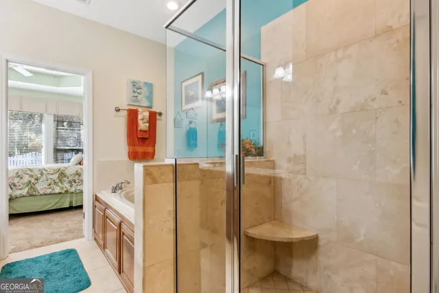 a bathroom with a tub and a shower