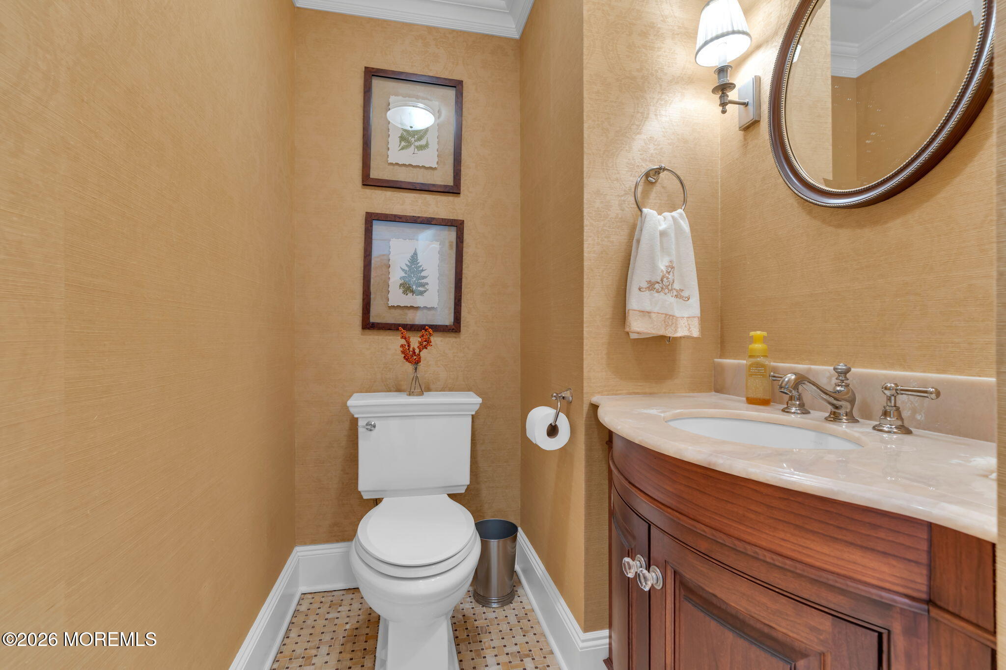672 Winding River Road Brick, NJ 08724 - Photo 31 of 111 a bathroom with a toilet sink and mirror
