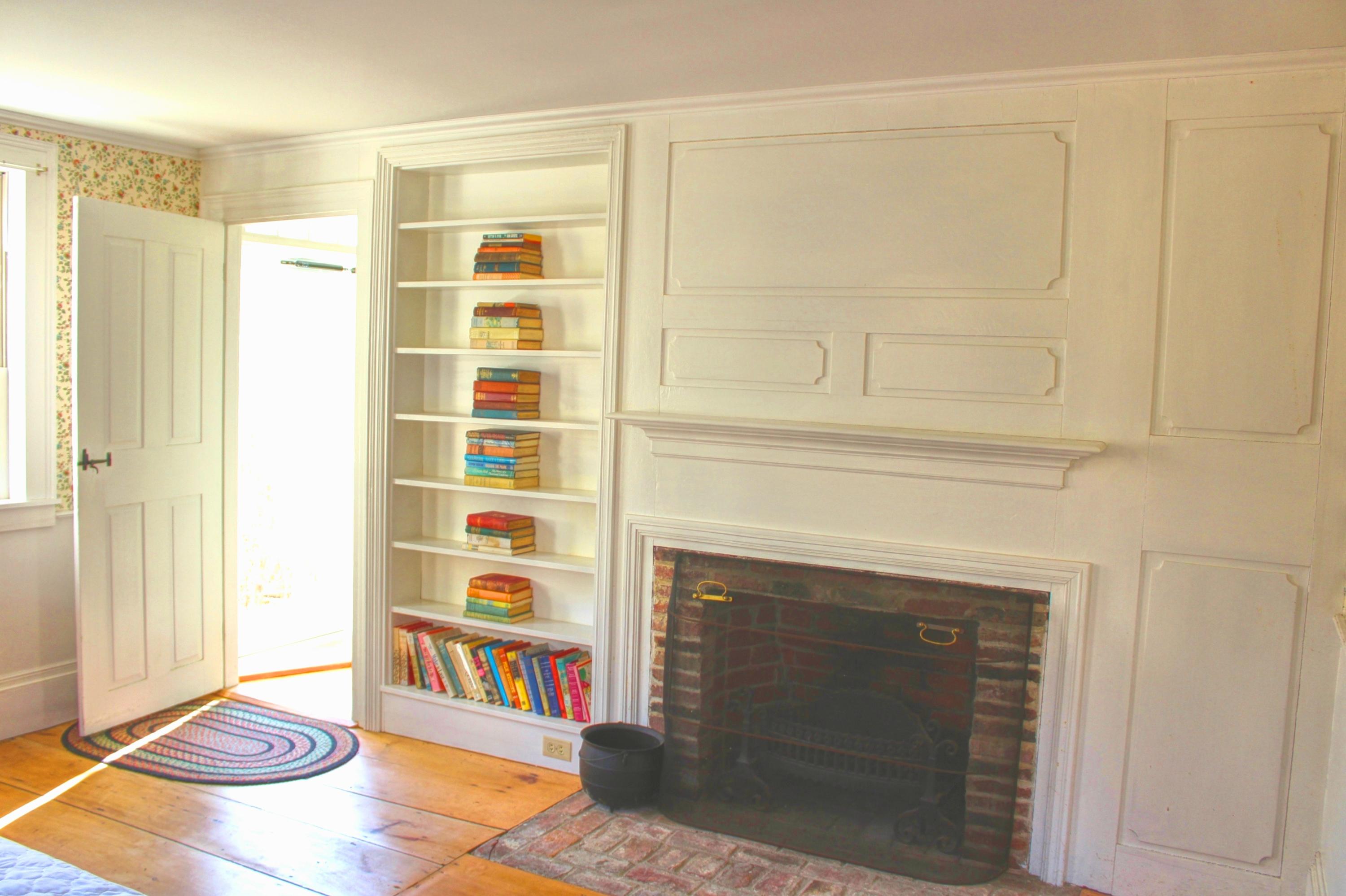 2 Noah's Way Truro, MA 02666 - Photo 11 of 21 a living room with a fireplace and a walk in closet with wooden floor