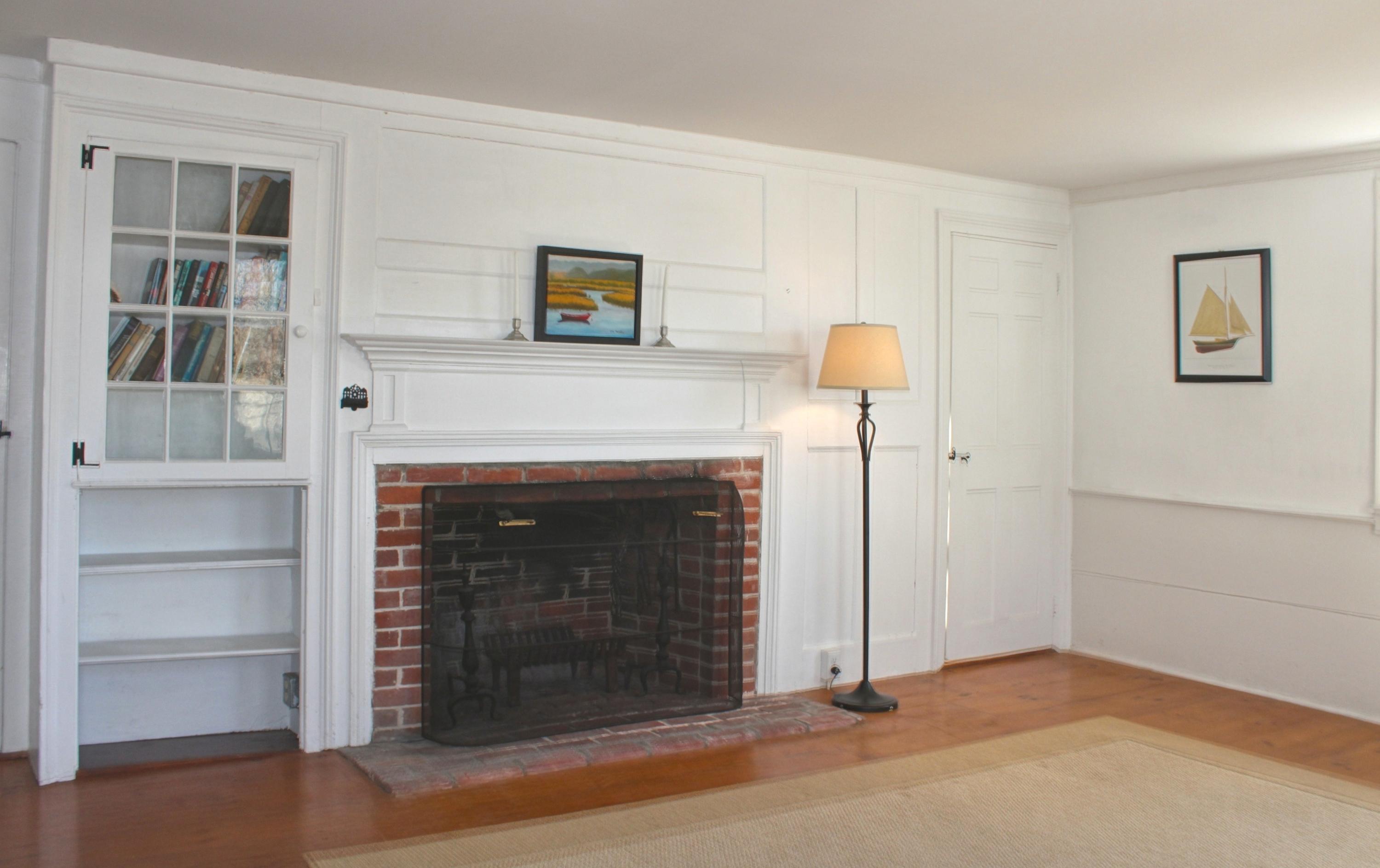 2 Noah's Way Truro, MA 02666 - Photo 5 of 21 a view of an empty room with a fireplace and a window