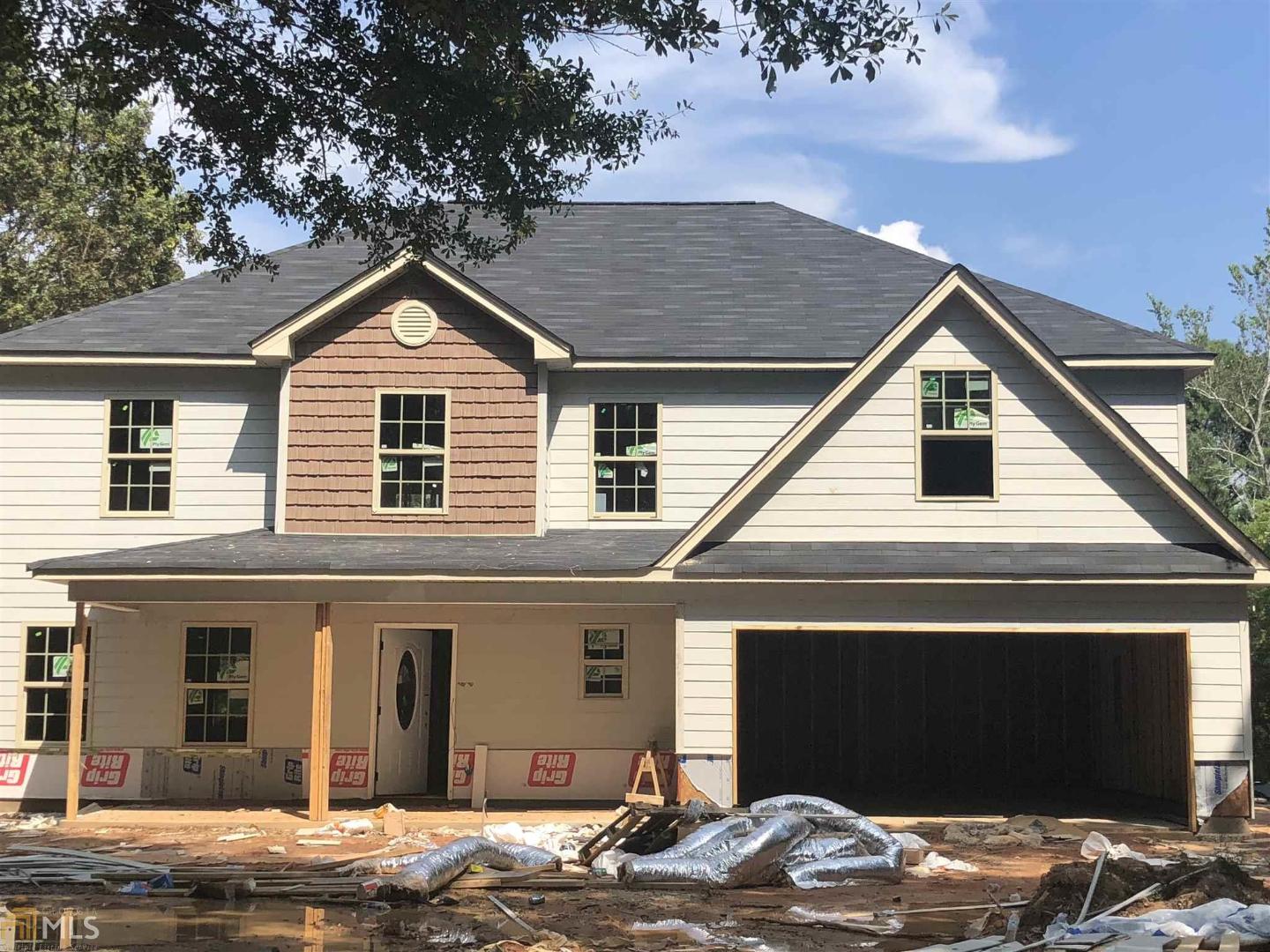 814 Arch Tanner Road Bethlehem, GA 30620 - Photo 1 of 1 a front view of a house with a yard