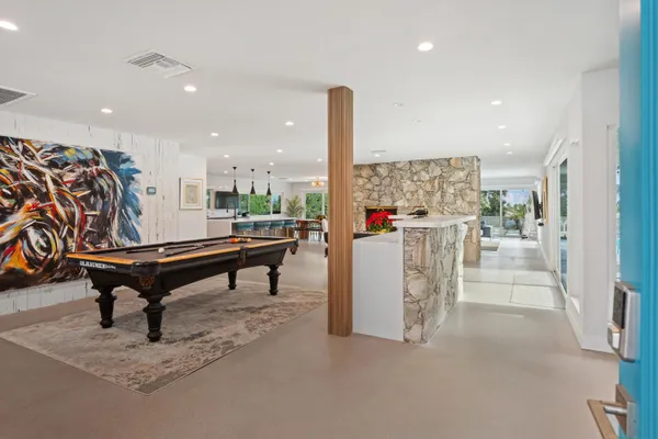 a room with lots of furniture and equipment