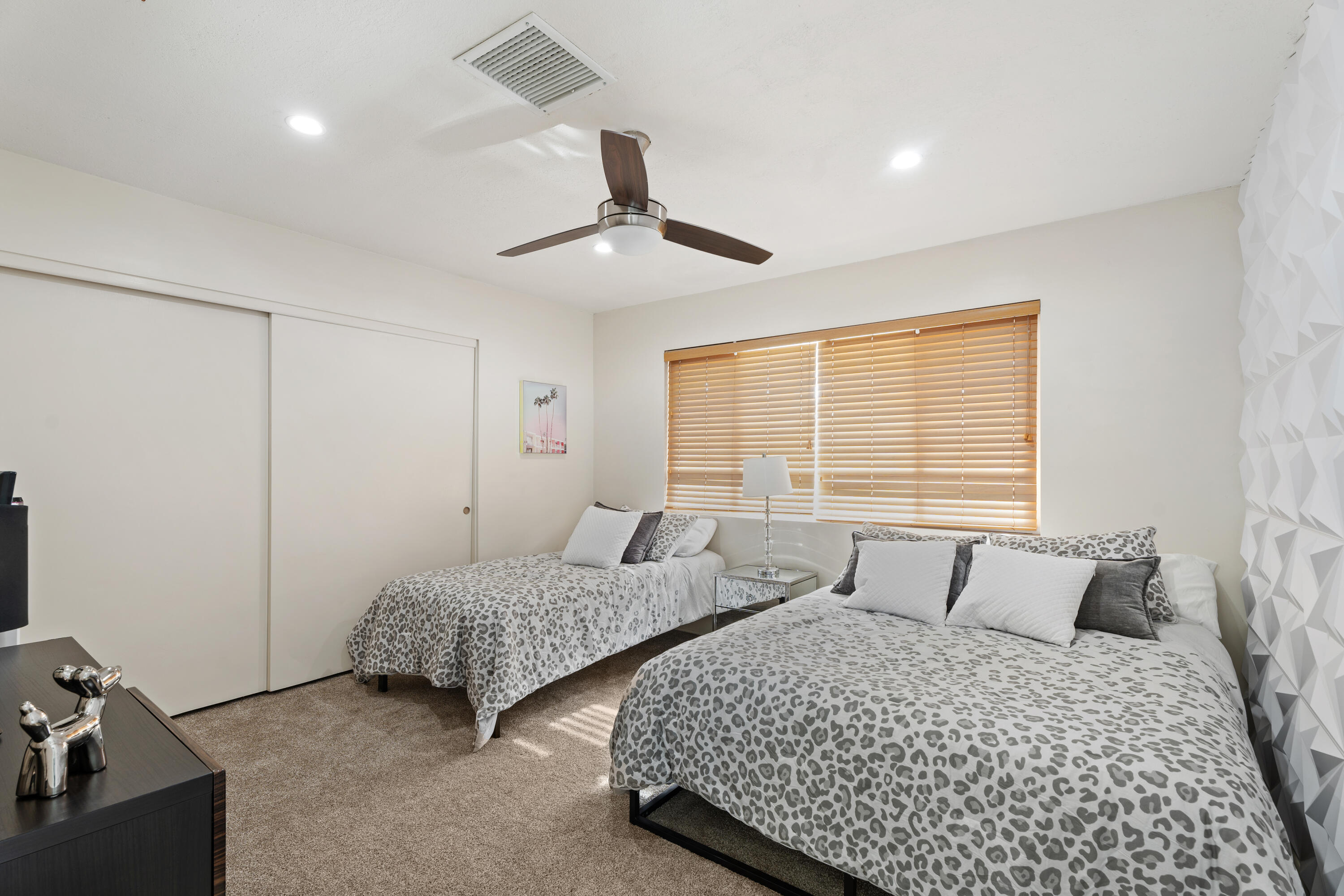 43490 Bath Point Court Bermuda Dunes, CA 92203 - Photo 23 of 38 a bedroom with two beds and ceiling fan