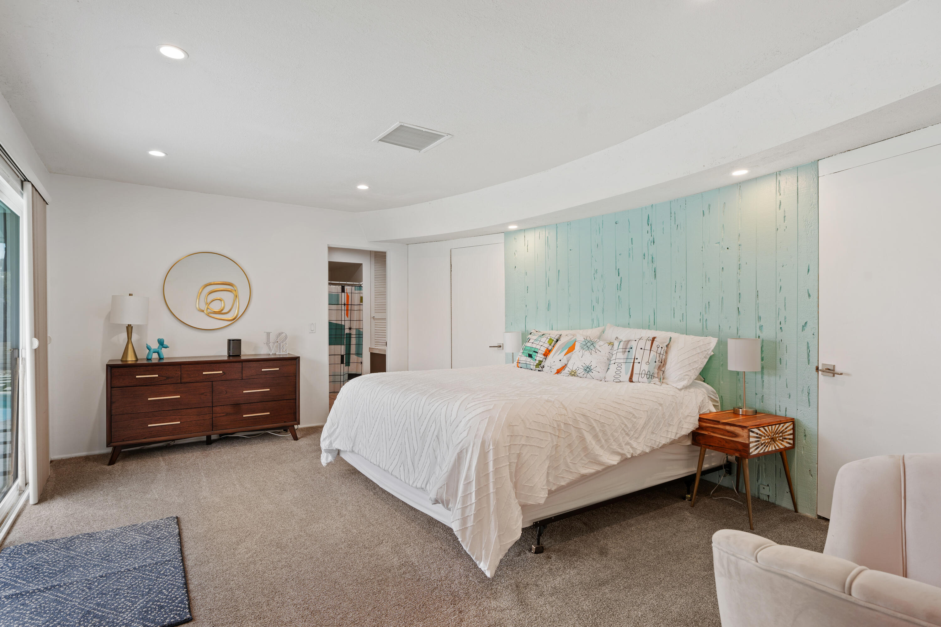 43490 Bath Point Court Bermuda Dunes, CA 92203 - Photo 25 of 38 a bedroom with a bed and a dresser