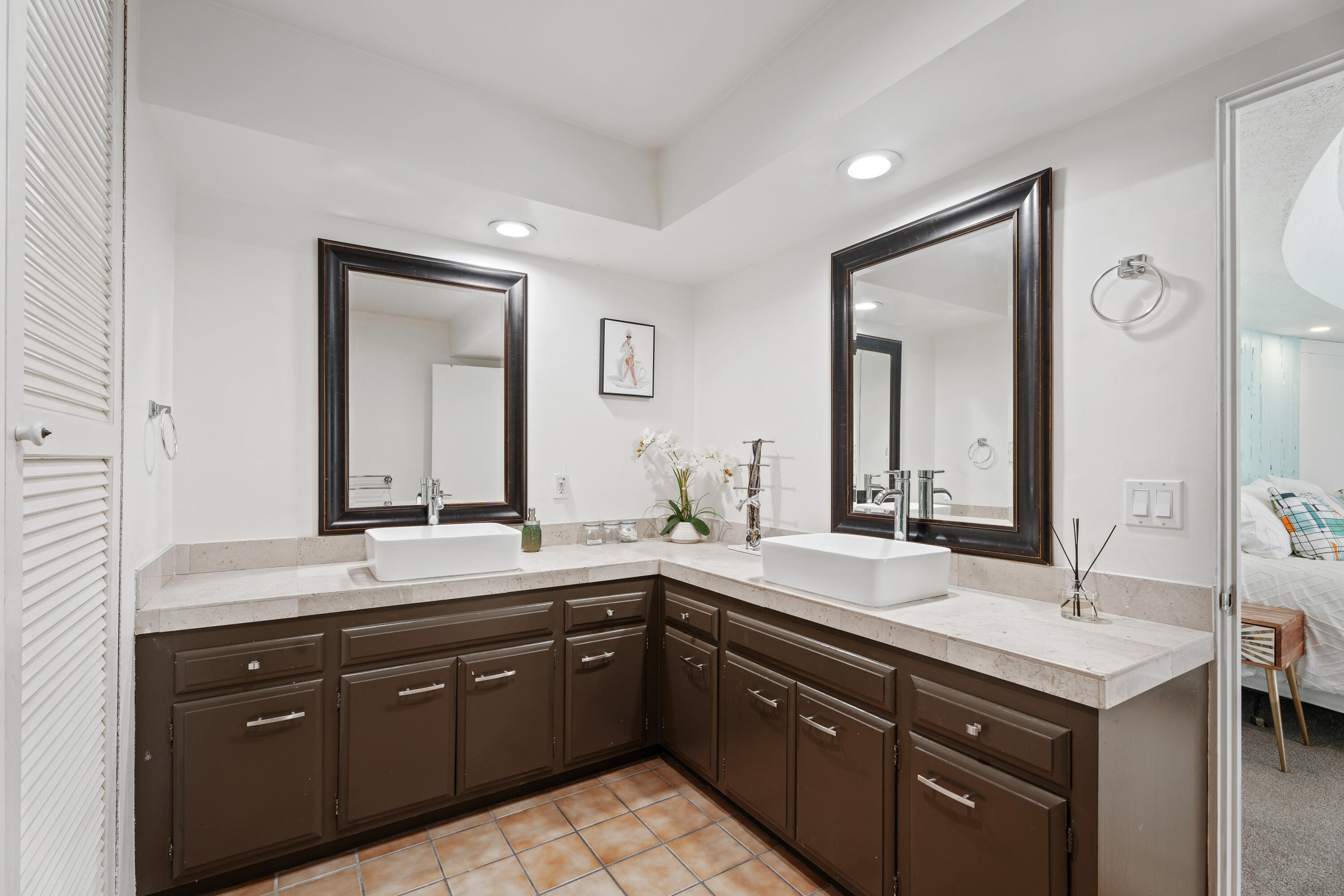 43490 Bath Point Court Bermuda Dunes, CA 92203 - Photo 29 of 38 a bathroom with a granite countertop sink double and mirror