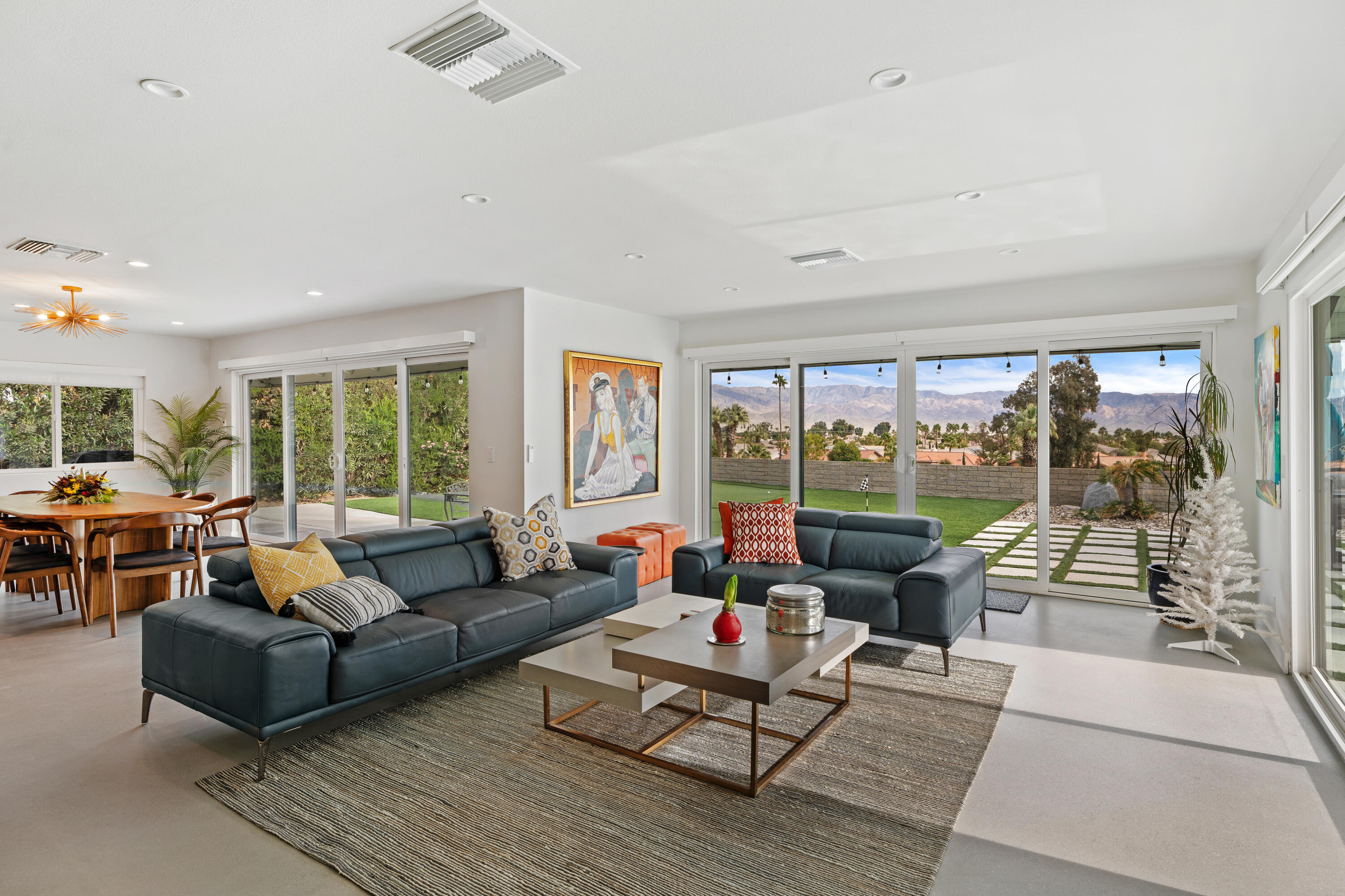 43490 Bath Point Court Bermuda Dunes, CA 92203 - Photo 10 of 38 a living room with furniture and a large window