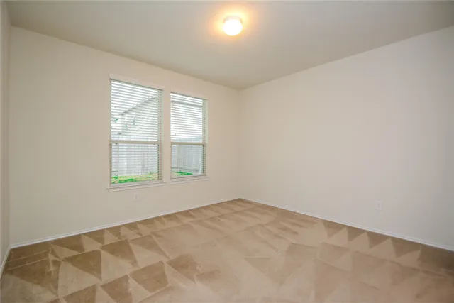 an empty room with a window