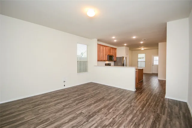 a view of kitchen with wooden floor