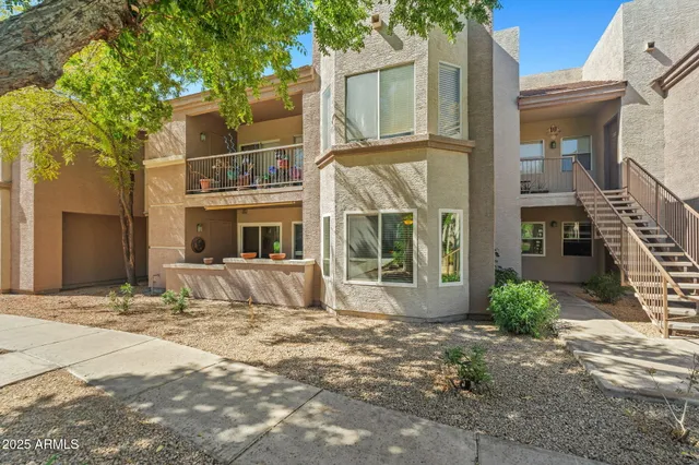 a view of a house with a street