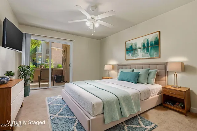 a bathroom with a granite countertop sink a toilet and a mirror