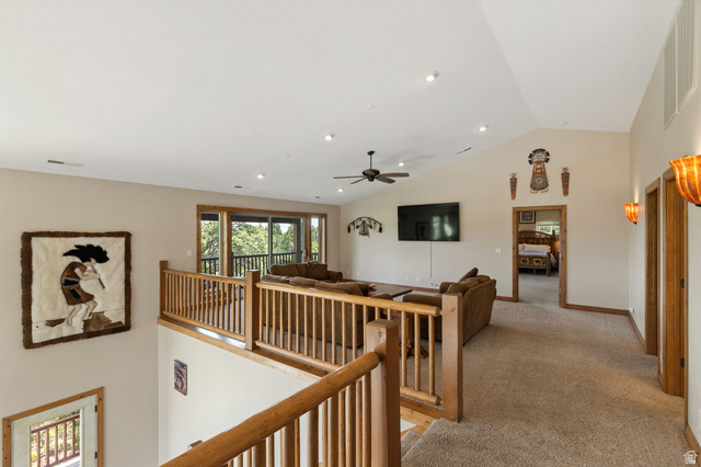755 South Zion Ridge Drive Orderville, UT 84758 - Photo 51 of 84 Hall with vaulted ceiling, carpet flooring, and recessed lighting