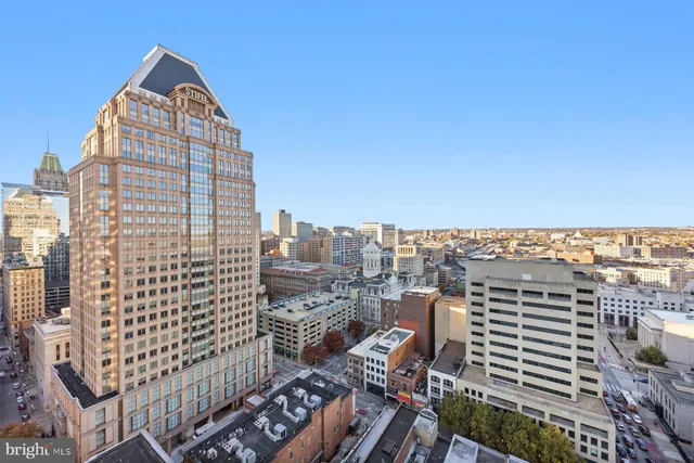 a view of a city with tall buildings