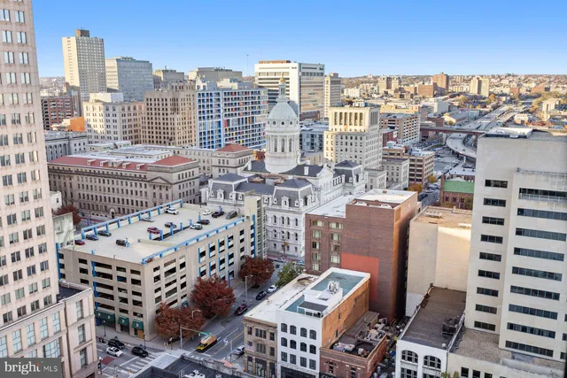 a view of city with tall buildings
