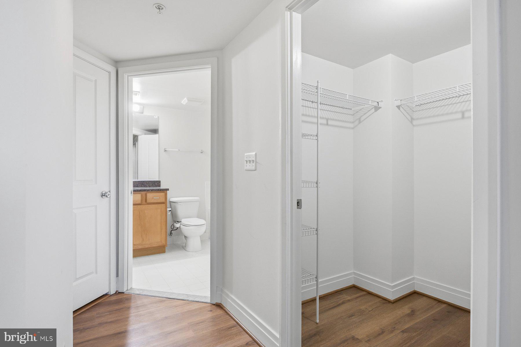 414 Water Street, Unit 2309 Baltimore, MD 21202 - Photo 6 of 36 a view of hallway with wooden floor