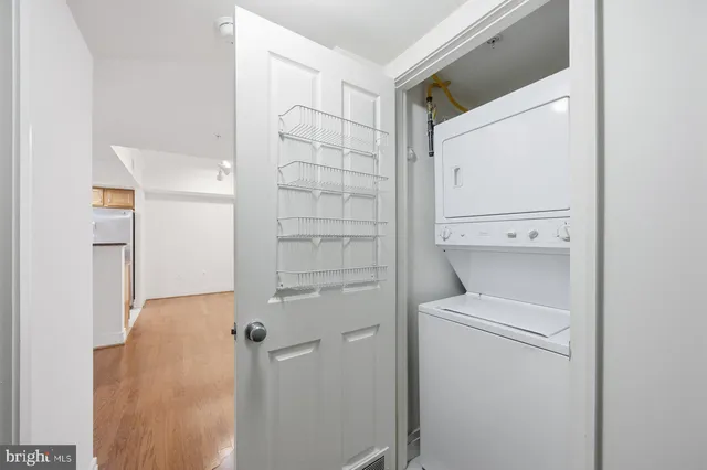 a bathroom with a shower and toilet