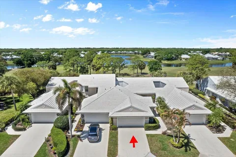 an aerial view of a house with a outdoor space