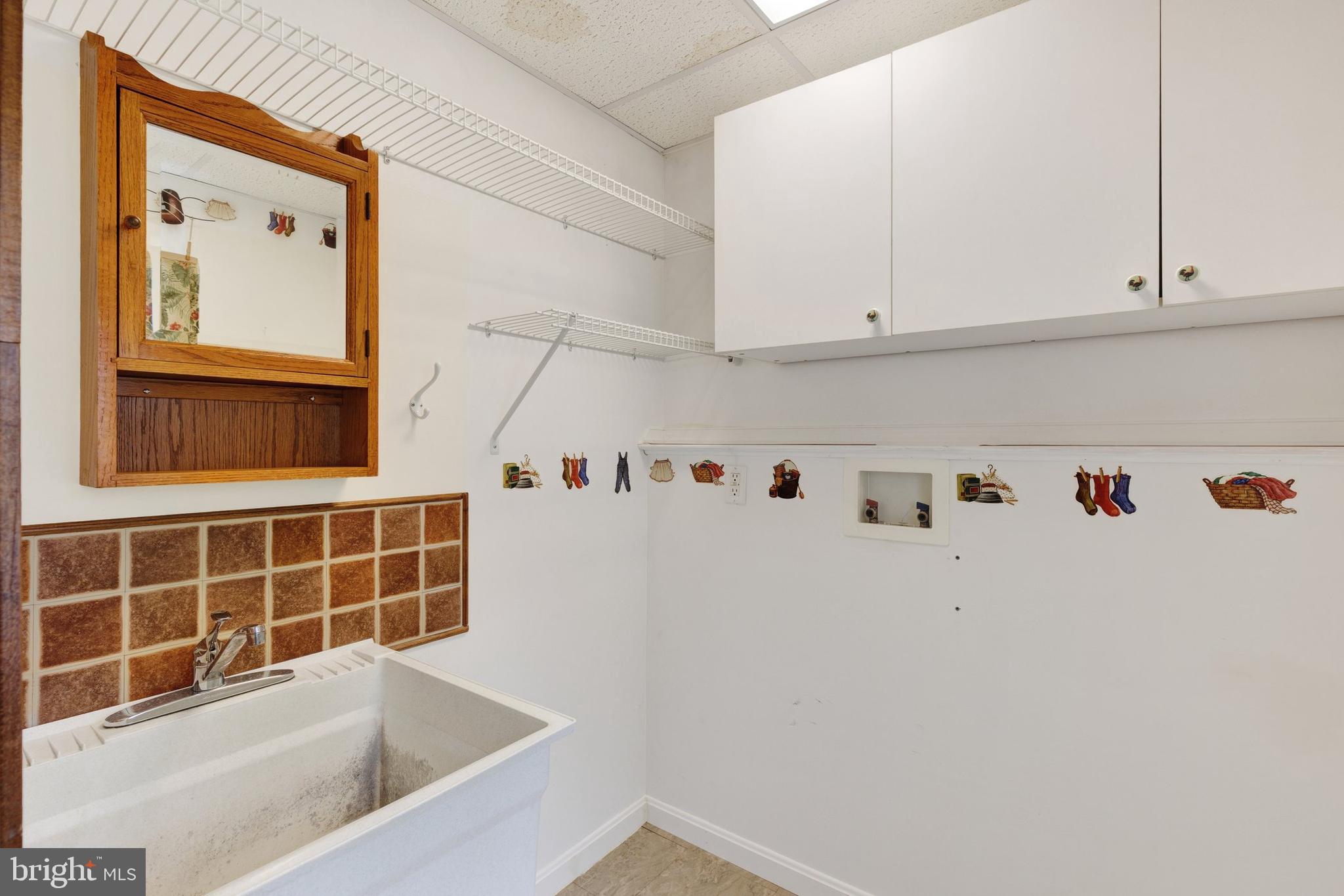 57 Pendyrus Street Delta, PA 17314 - Photo 12 of 28 Separate Laundry Room off Kitchen