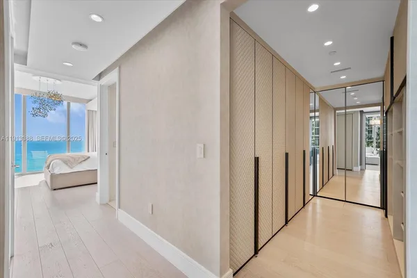 a bedroom with a bed and a chair