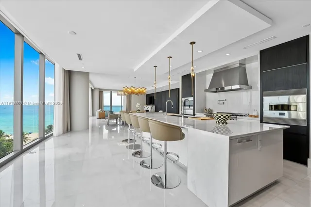 a kitchen with counter top space cabinets and stainless steel appliances
