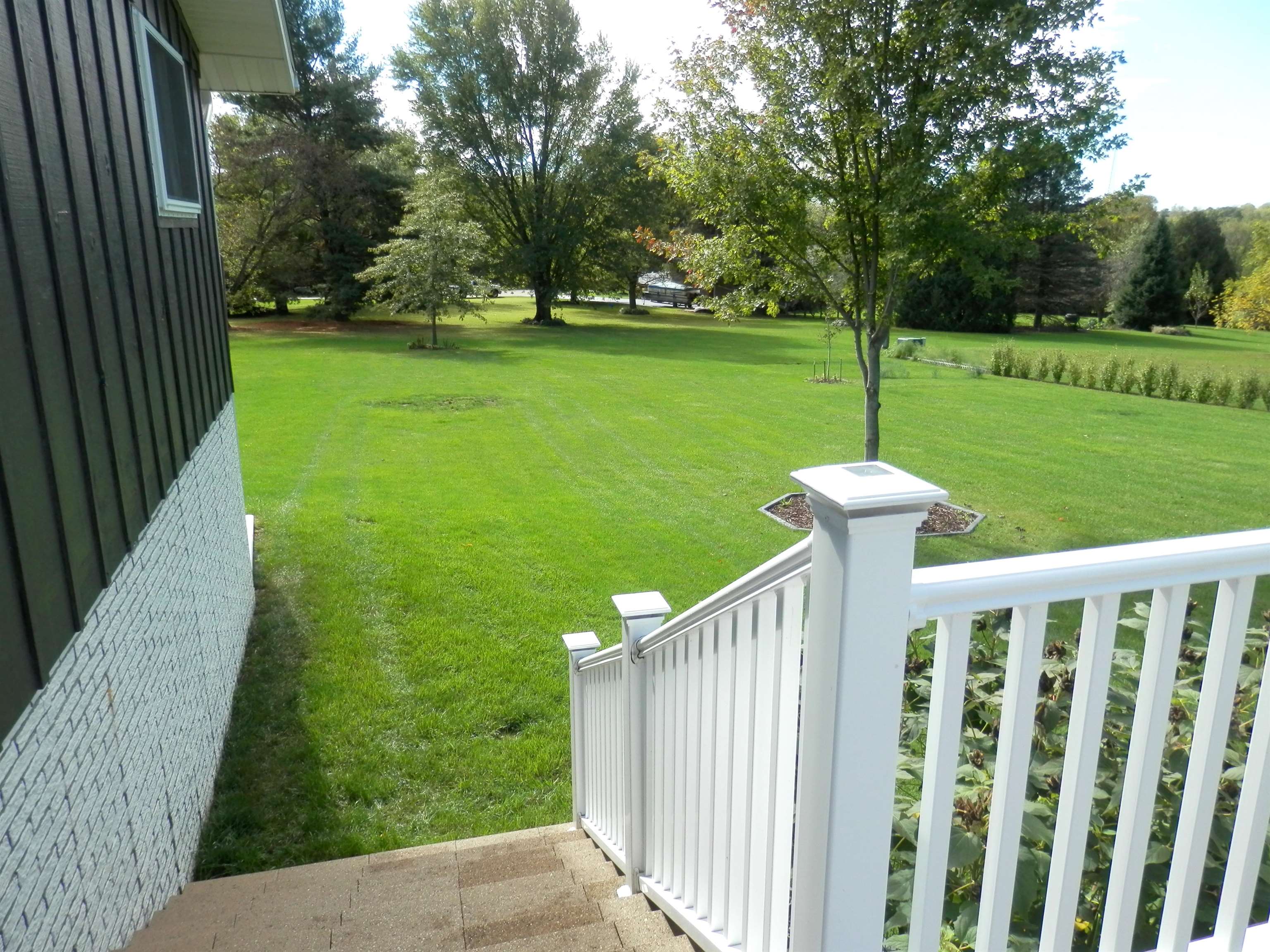 980 Winborne Road Lake Summerset, IL 61019 - Photo 12 of 58 a view of a garden from a patio
