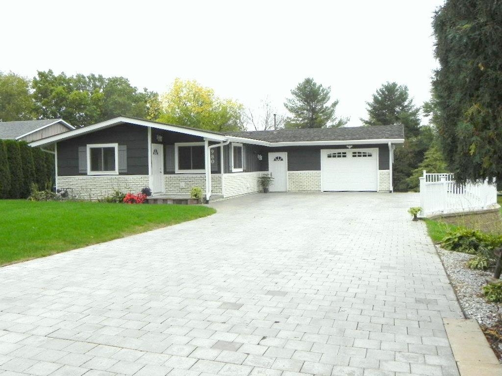 980 Winborne Road Lake Summerset, IL 61019 - Photo 2 of 58 a front view of house with yard and green space