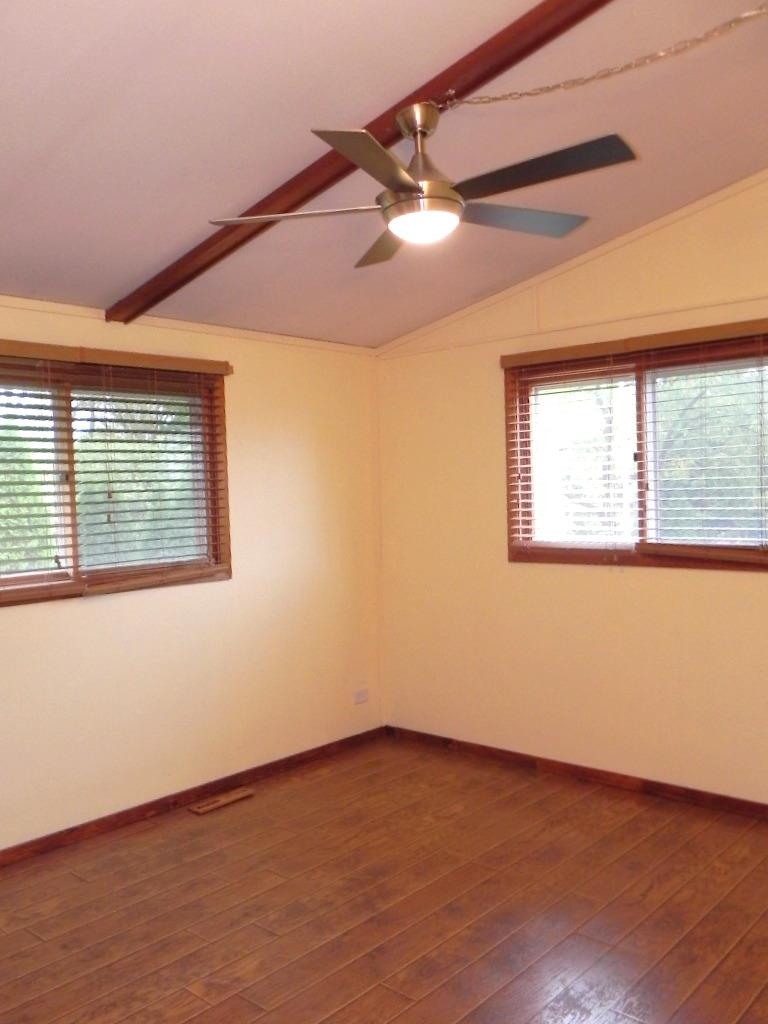 980 Winborne Road Lake Summerset, IL 61019 - Photo 33 of 58 an empty room with wooden floor and windows