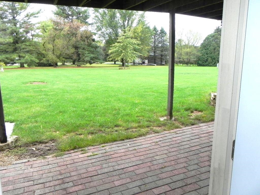 980 Winborne Road Lake Summerset, IL 61019 - Photo 41 of 58 a view of a yard with an outdoor space