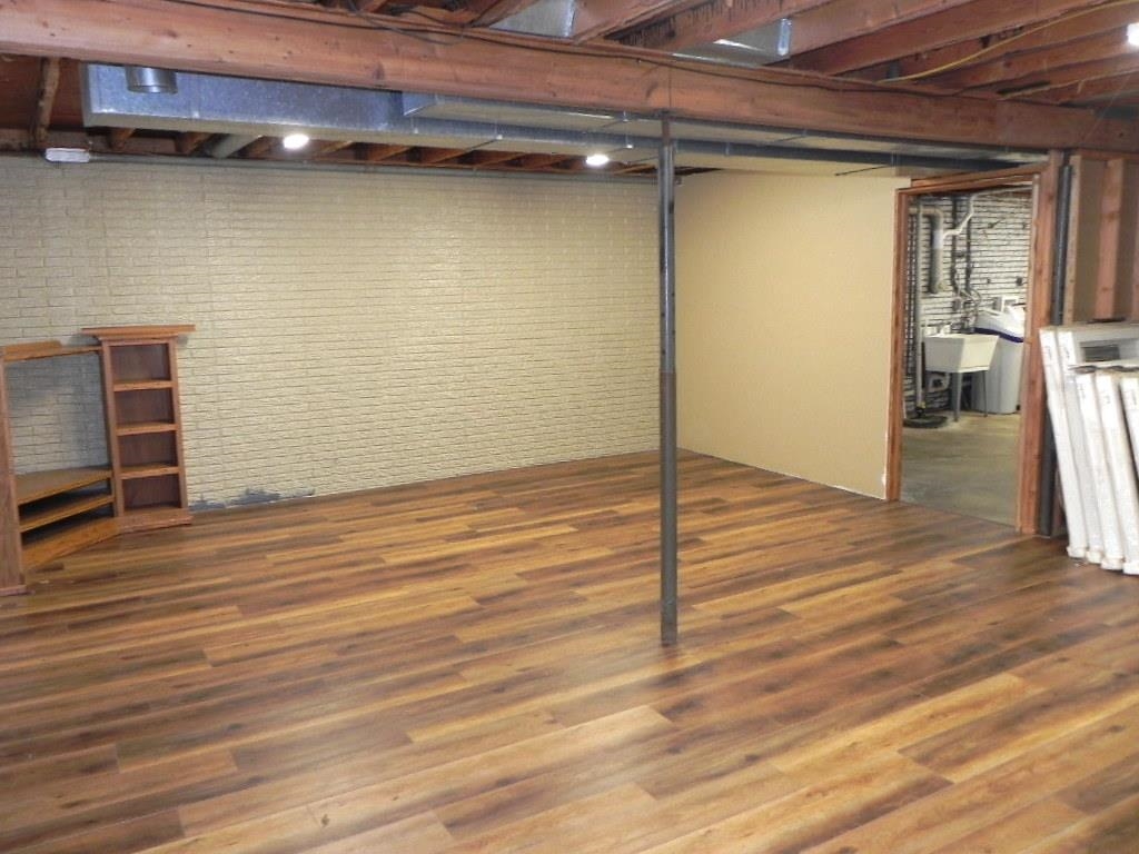 980 Winborne Road Lake Summerset, IL 61019 - Photo 44 of 58 a view of a room with wooden floor