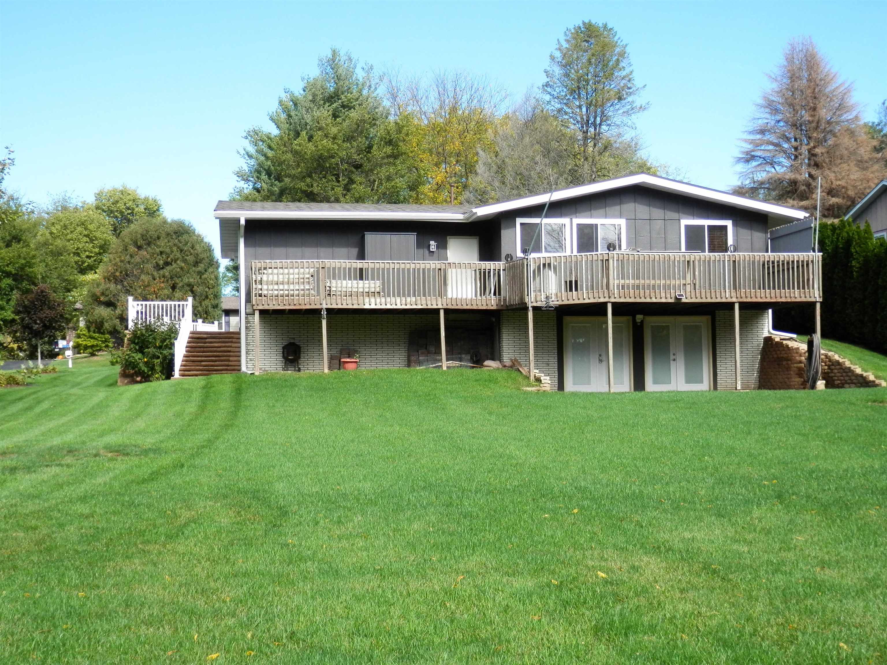 980 Winborne Road Lake Summerset, IL 61019 - Photo 7 of 58 a view of an house with backyard space and balcony