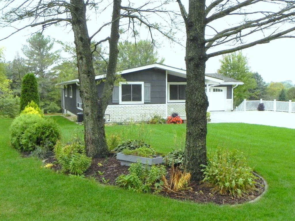980 Winborne Road Lake Summerset, IL 61019 - Photo 8 of 58 a front view of house with yard and green space