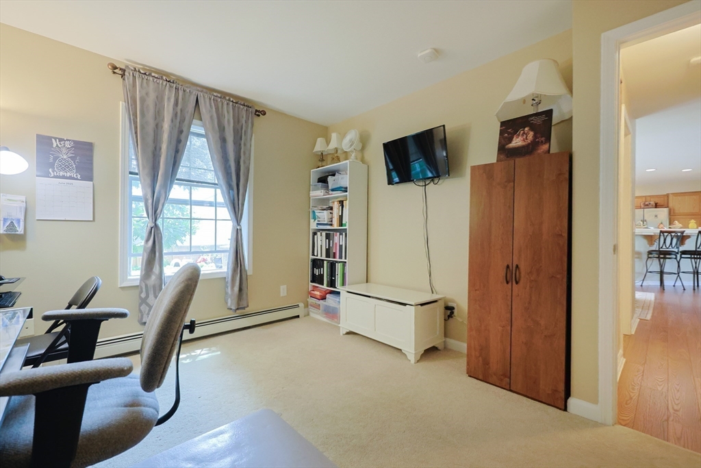 4 Colonial Road Webster, MA 01570 - Photo 28 of 38 a view of a livingroom with furniture and windows