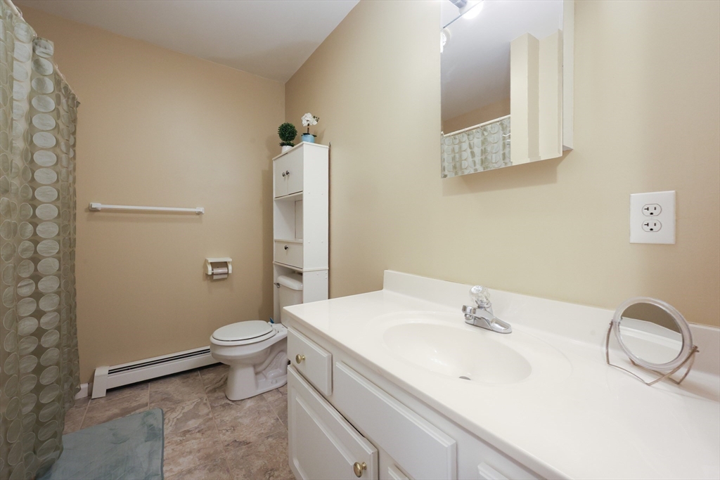 4 Colonial Road Webster, MA 01570 - Photo 29 of 38 a bathroom with a sink toilet and shower