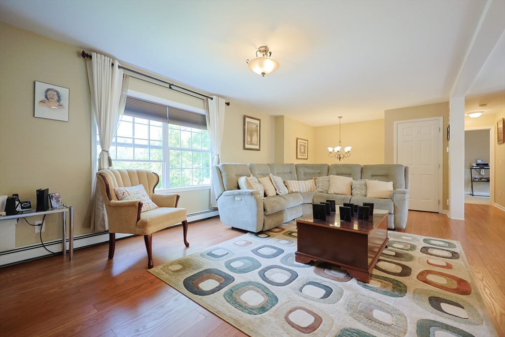 4 Colonial Road Webster, MA 01570 - Photo 7 of 38 a living room with furniture and a large window
