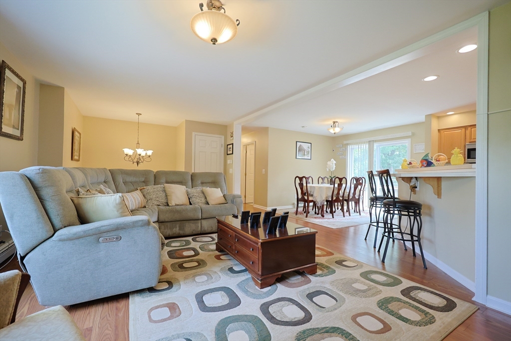 4 Colonial Road Webster, MA 01570 - Photo 8 of 38 a living room with furniture and wooden floor