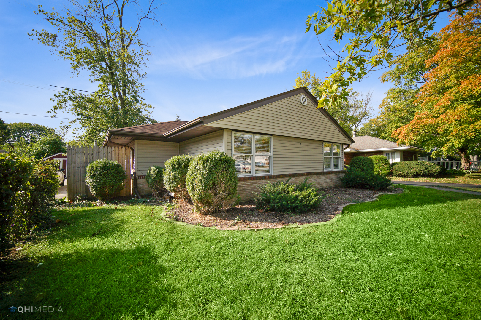 1217 183rd Street Homewood, IL 60430 - Photo 1 of 19 a front view of a house with garden