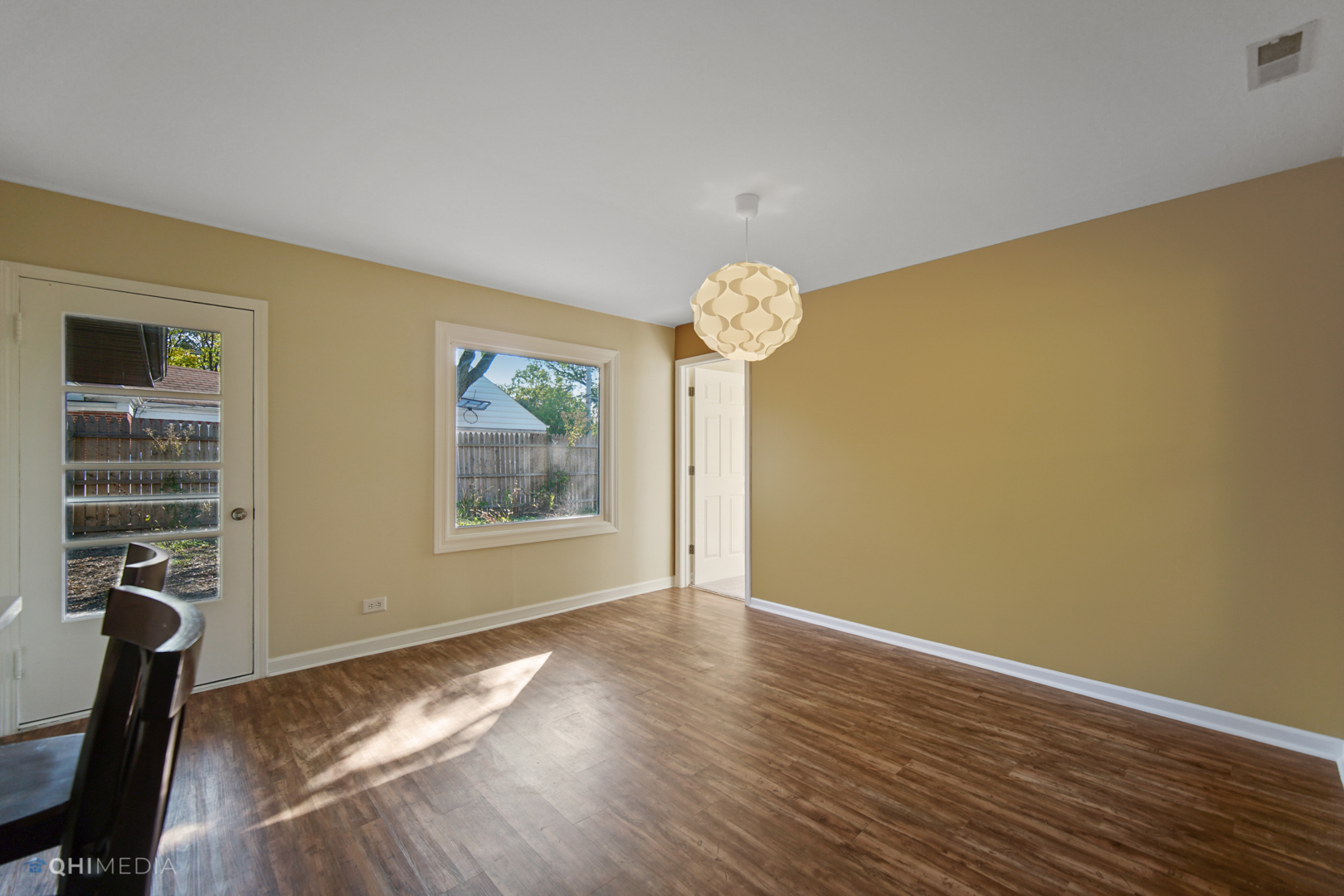 1217 183rd Street Homewood, IL 60430 - Photo 6 of 19 a view of room with window and wooden floor