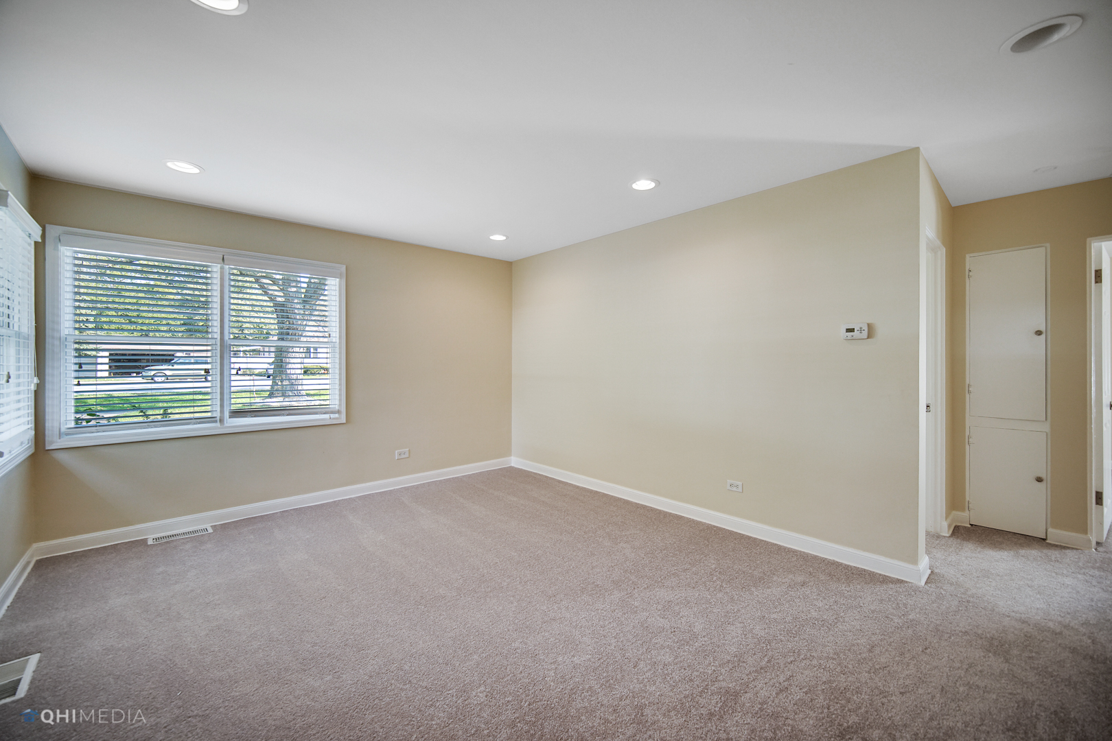1217 183rd Street Homewood, IL 60430 - Photo 10 of 19 a view of an empty room with a window
