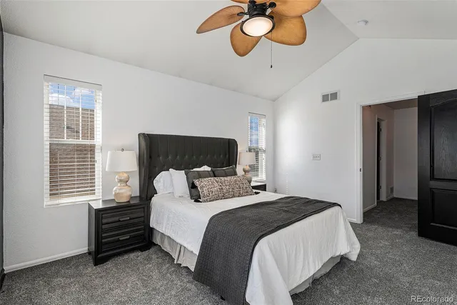 a bedroom with a bed and dresser