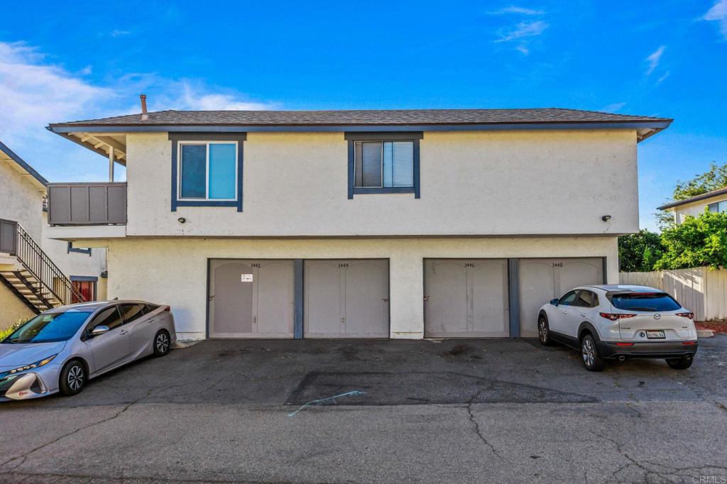 3446 Los Mochis Way Oceanside, CA 92056 - Photo 3 of 17 a couple of cars parked in front of a house