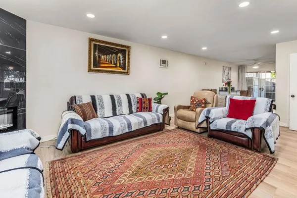 a bedroom with a bed and couch