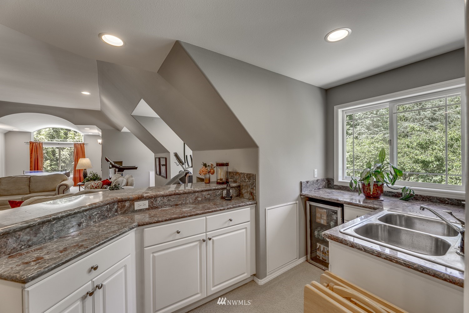 13819 3rd Drive Southeast Everett, WA 98208 - Photo 32 of 39 a kitchen with a sink and a stove