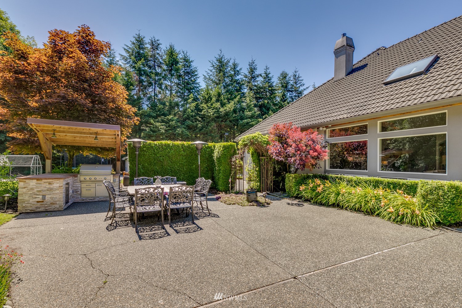 13819 3rd Drive Southeast Everett, WA 98208 - Photo 37 of 39 a view of a house with backyard sitting area and garden