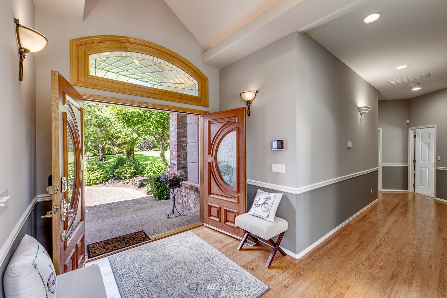 13819 3rd Drive Southeast Everett, WA 98208 - Photo 6 of 39 a view of an entryway with wooden floor and a rug