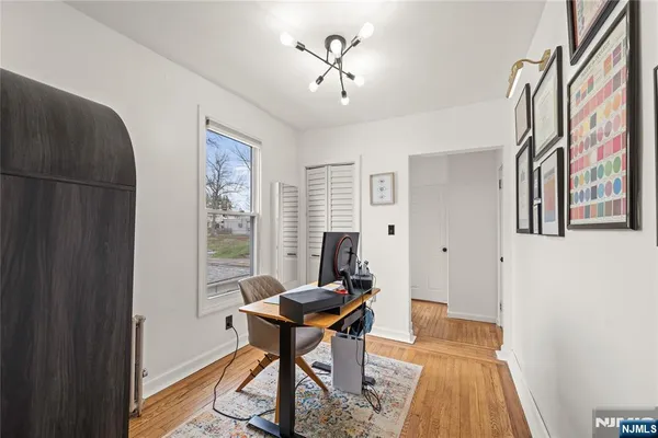 a workspace with furniture and a window