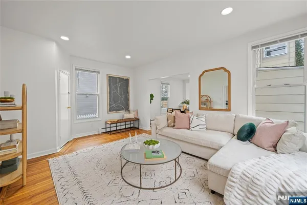 a living room with furniture and a table