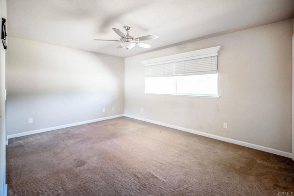 4990 Del Road Loomis, CA 95650 - Photo 14 of 22 an empty room with a window and a fan